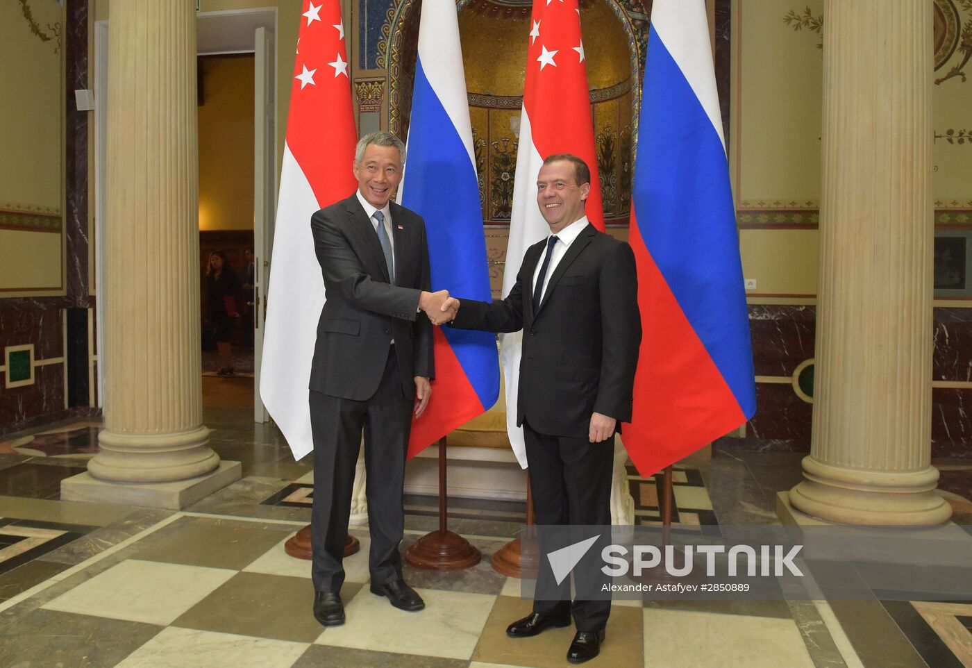 Russian Prime Minister Dmitry Medvedev meets with citizens at United Russia's Moscow reception office
