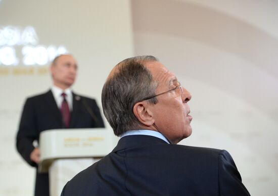 Russian President Vladimir Putin and Prime Minister of Laos Thongloun Sisoulith hold news conference following ASEAN-Russia Summit