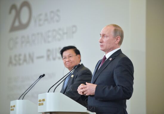 Russian President Vladimir Putin and Prime Minister of Laos Thongloun Sisoulith hold news conference following ASEAN-Russia Summit