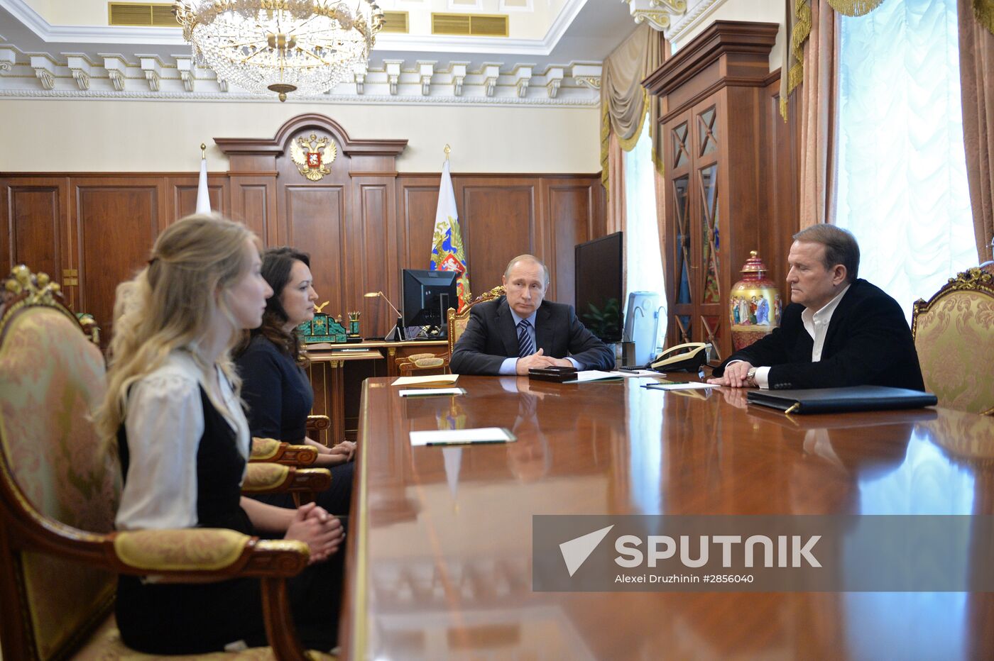President Vladimir Putin meets with widows of journalists killed in Ukraine performing professional duty