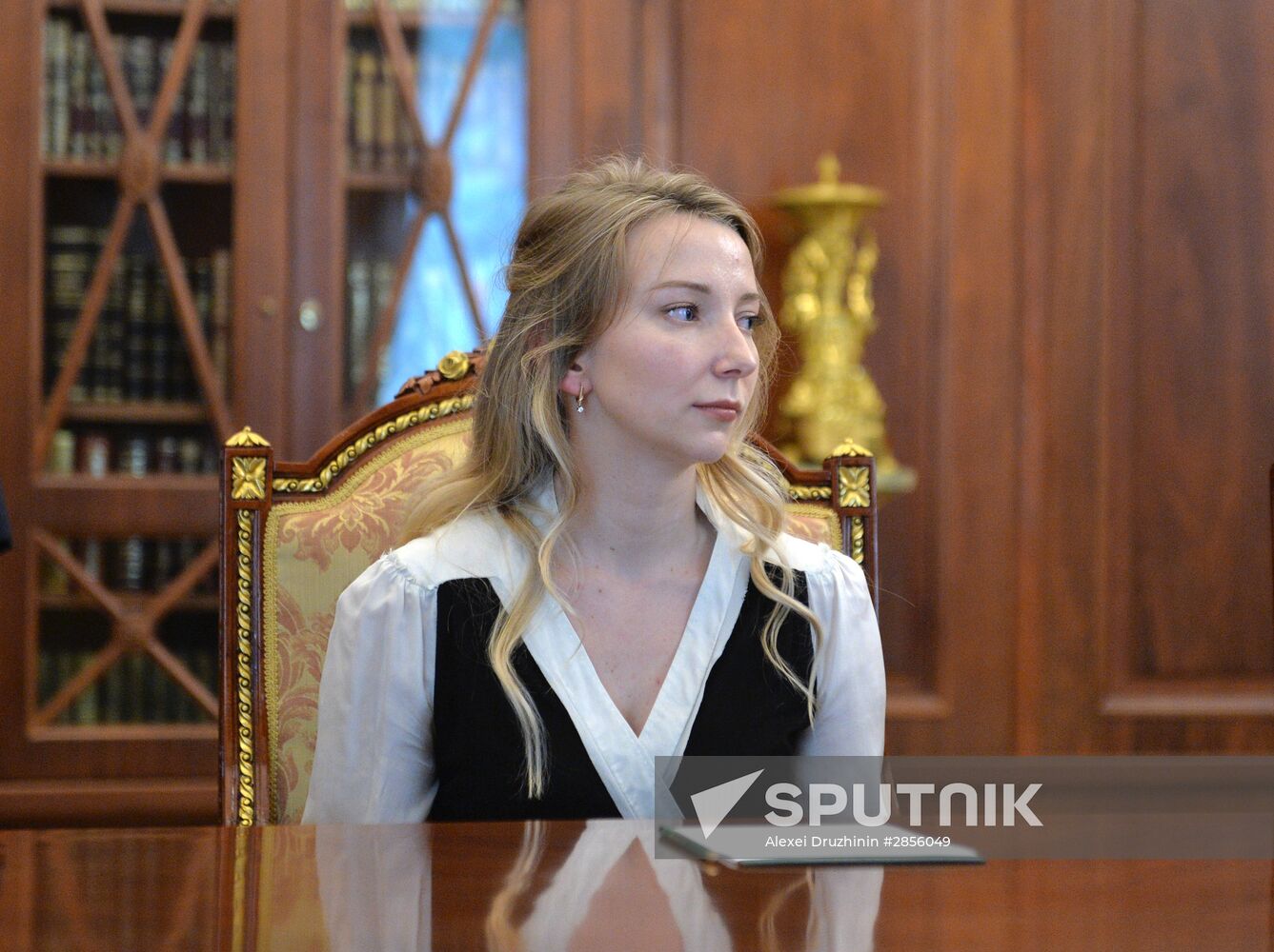 President Vladimir Putin meets with widows of journalists killed in Ukraine performing professional duty