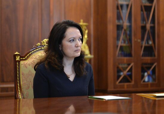 President Vladimir Putin meets with widows of journalists killed in Ukraine performing professional duty