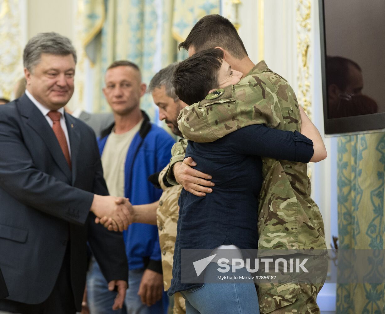 Ukrainian President Petro Poroshenko awards Nadezhda Savchenko the Order of Gold Star