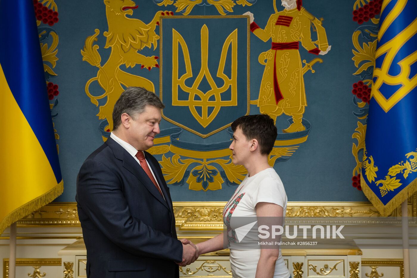 Ukrainian President Petro Poroshenko awards Nadezhda Savchenko the Order of Gold Star