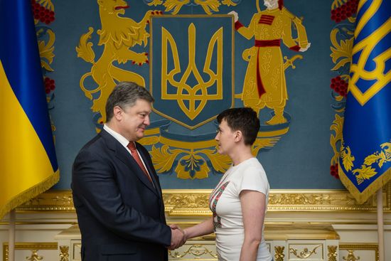 Ukrainian President Petro Poroshenko awards Nadezhda Savchenko the Order of Gold Star