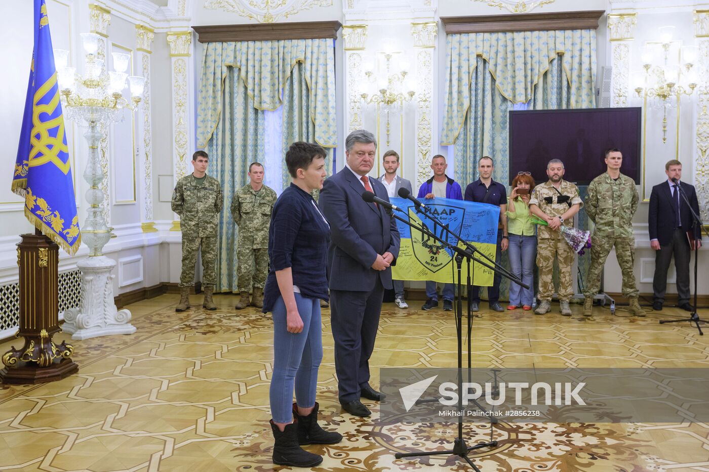 Ukrainian President Petro Poroshenko awards Nadezhda Savchenko the Order of Gold Star