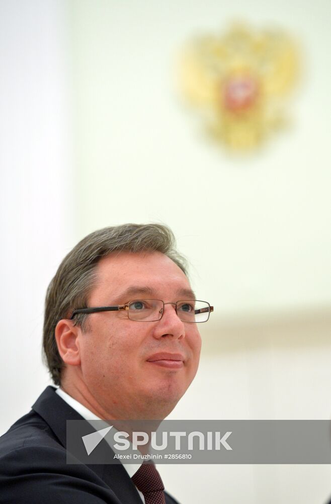 Russian President Vladimir Putin meets with Serbian Prime Minister Aleksandar Vucic