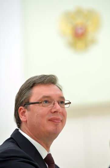 Russian President Vladimir Putin meets with Serbian Prime Minister Aleksandar Vucic