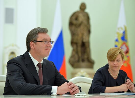 Russian President Vladimir Putin meets with Serbian Prime Minister Aleksandar Vucic