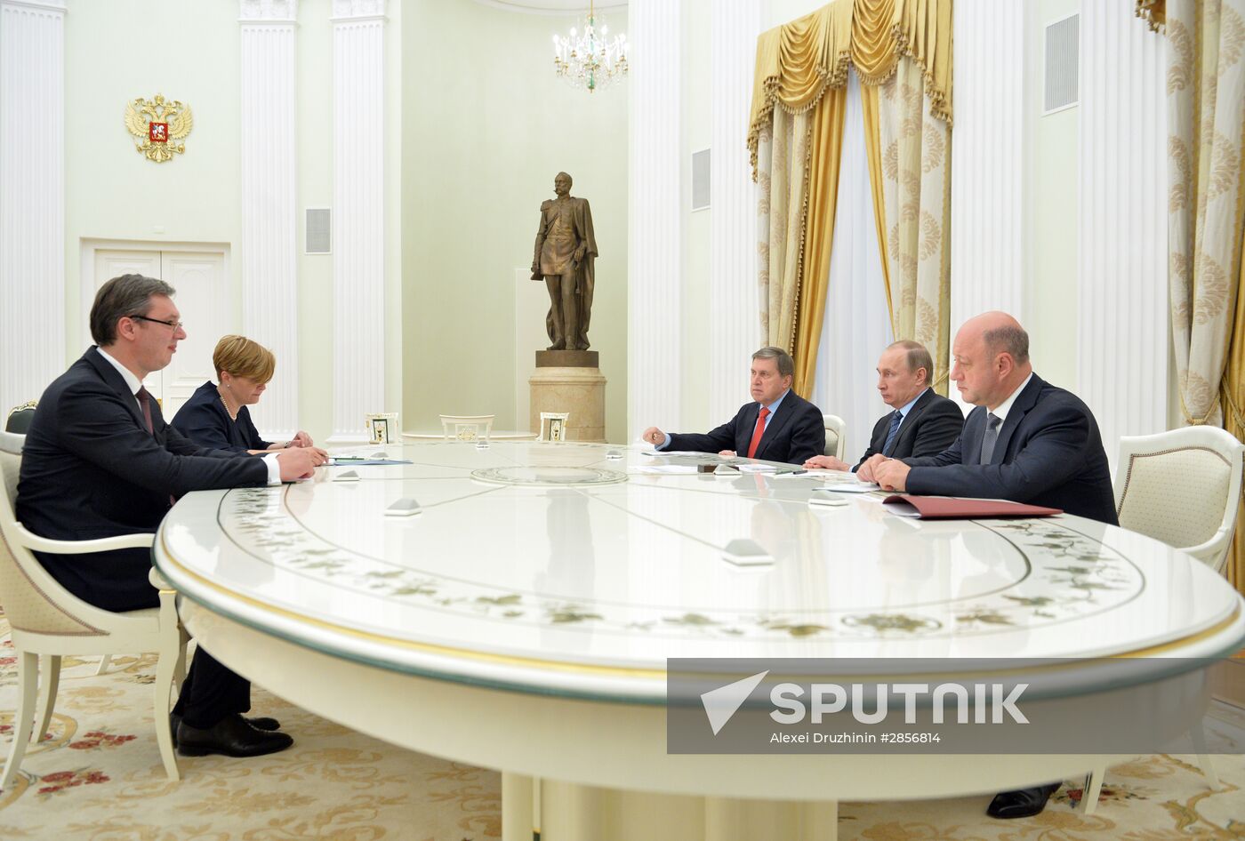 Russian President Vladimir Putin meets with Serbian Prime Minister Aleksandar Vucic