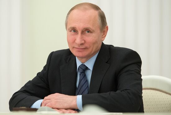 Russian President Vladimir Putin meets with Serbian Prime Minister Aleksandar Vucic