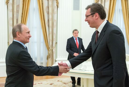 Russian President Vladimir Putin meets with Serbian Prime Minister Aleksandar Vucic