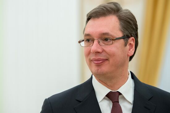 Russian President Vladimir Putin meets with Serbian Prime Minister Aleksandar Vucic