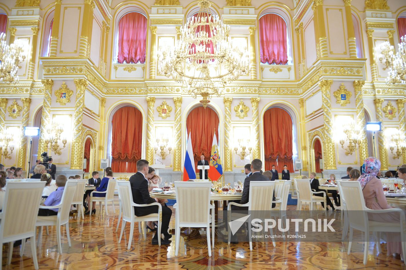 Vladimir Putin presents Order of Parental Glory to parents of many children