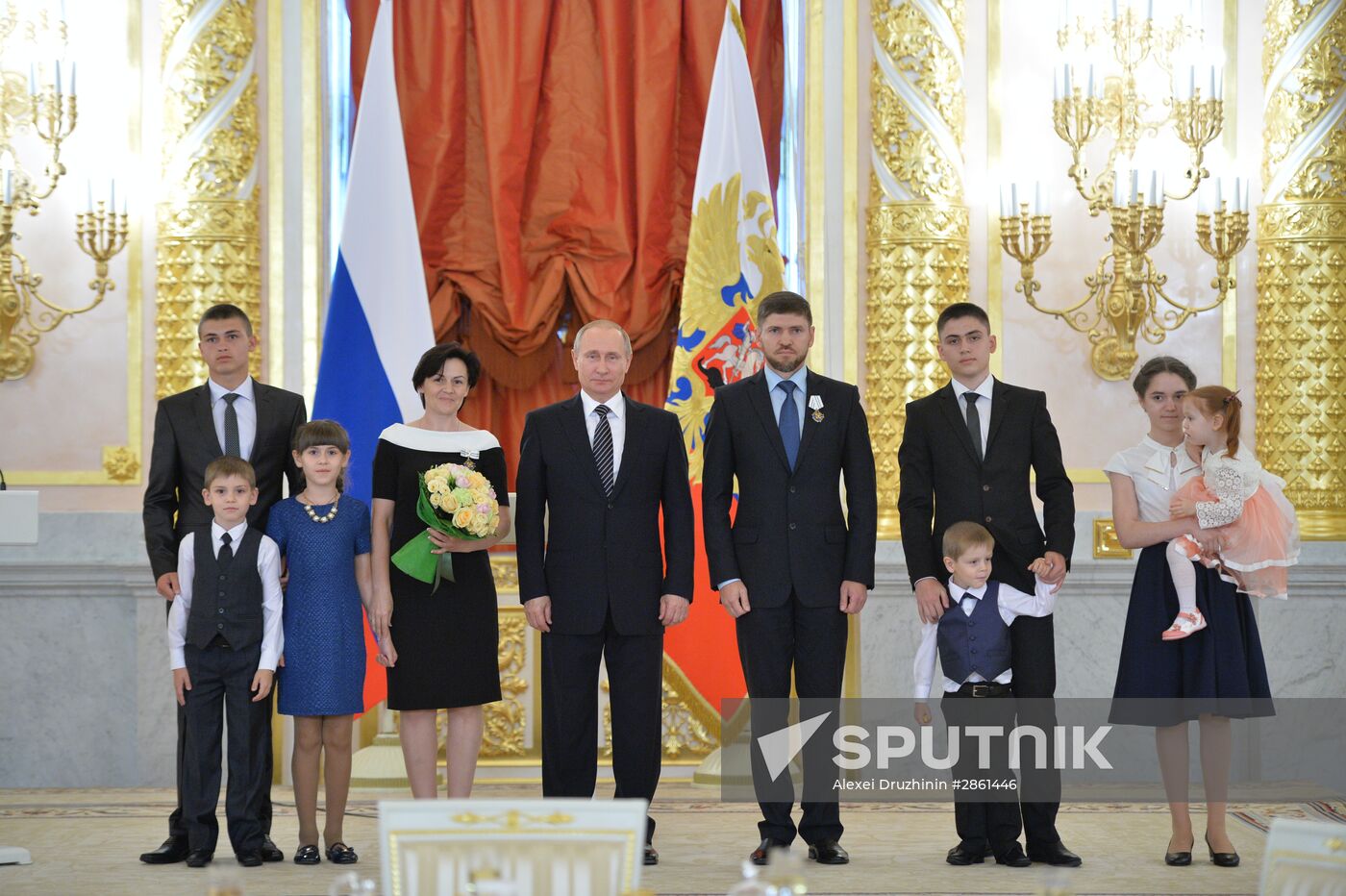 Vladimir Putin presents Order of Parental Glory to parents of many children