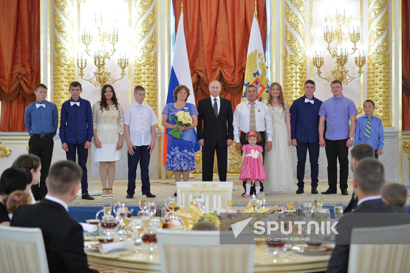 Vladimir Putin presents Order of Parental Glory to parents of many children