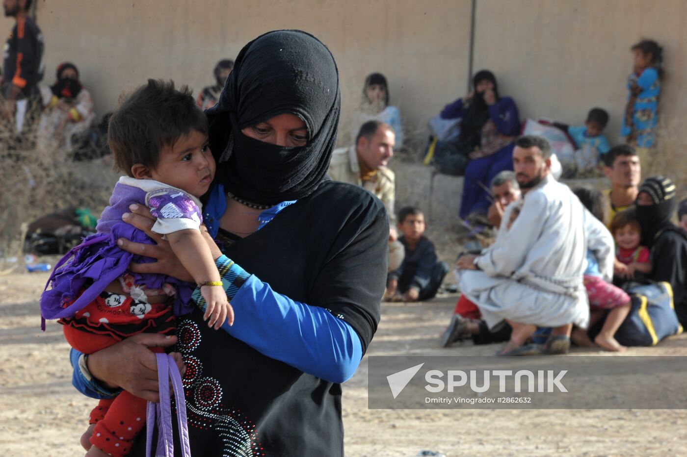 Refugees from ISIS-occupied areas come to Kirkuk in Iraq