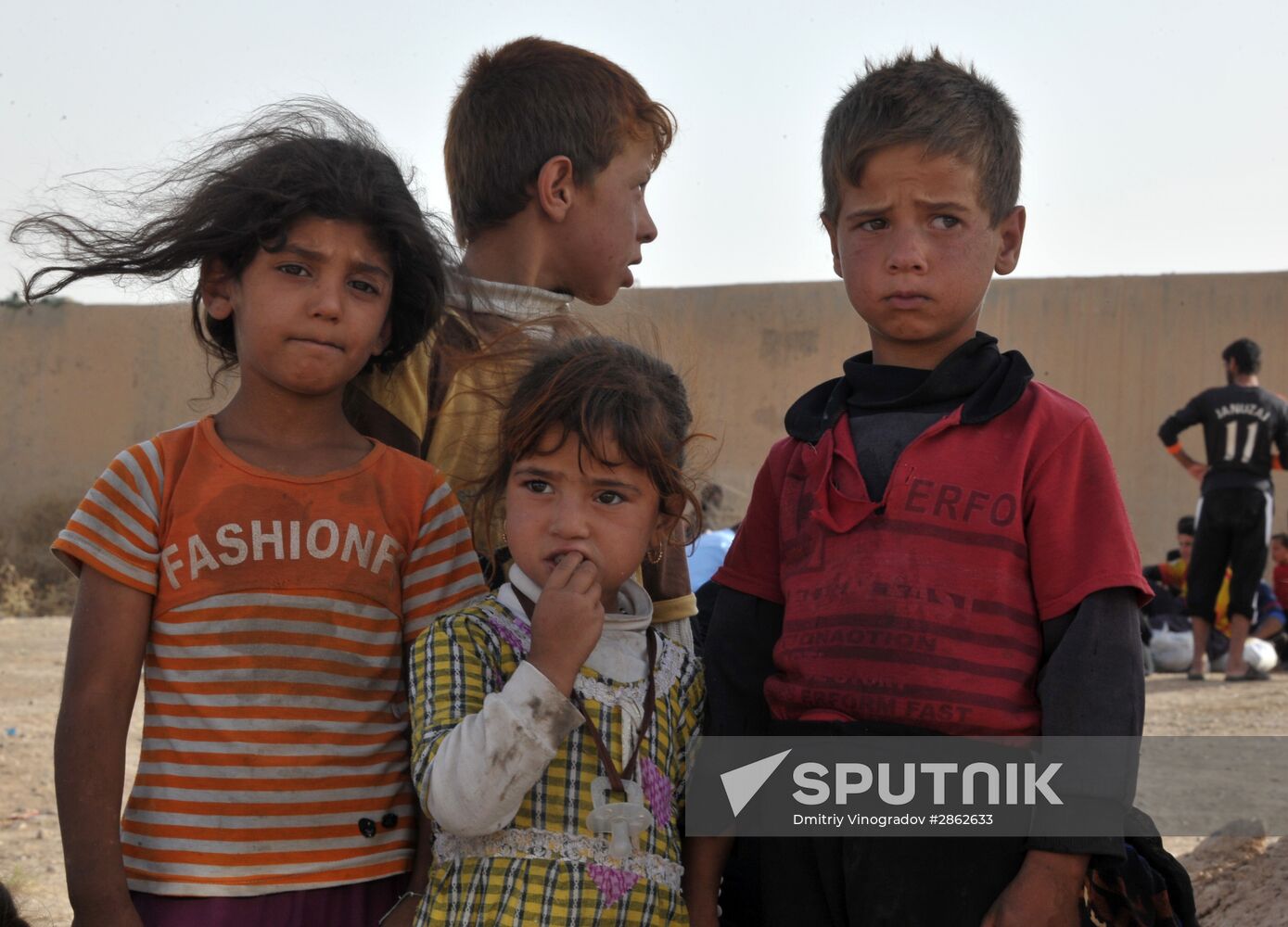 Refugees from ISIS-occupied areas come to Kirkuk in Iraq