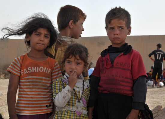 Refugees from ISIS-occupied areas come to Kirkuk in Iraq