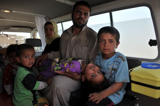 Refugees from ISIS-occupied areas come to Kirkuk in Iraq