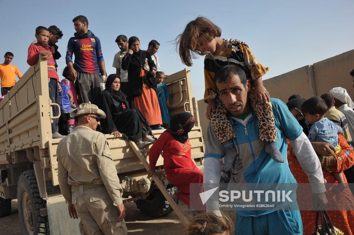 Refugees from ISIS-occupied areas come to Kirkuk in Iraq