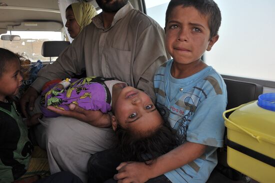 Refugees from ISIS-occupied areas come to Kirkuk in Iraq