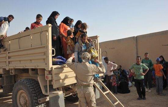 Refugees from ISIS-occupied areas come to Kirkuk in Iraq
