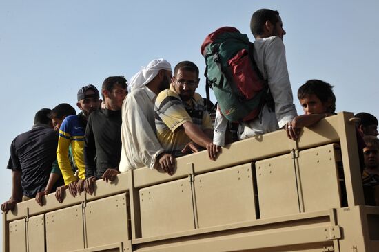 Refugees from ISIS-occupied areas come to Kirkuk in Iraq