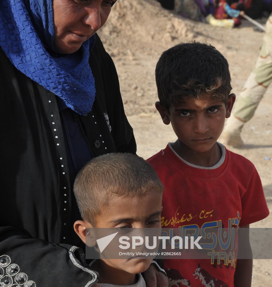 Refugees from ISIL-occupied lands come to Kirkuk in Iraq