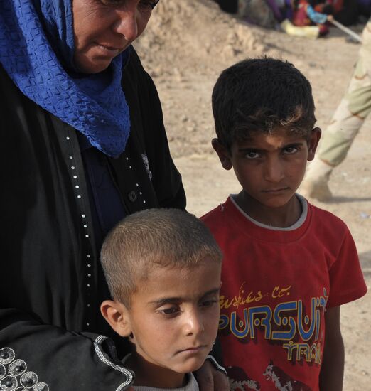 Refugees from ISIL-occupied lands come to Kirkuk in Iraq