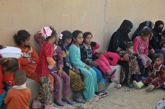 Refugees from ISIL-occupied lands come to Kirkuk in Iraq
