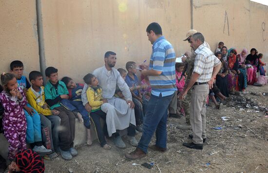 Refugees from ISIS-occupied lands come to Kirkuk in Iraq
