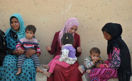 Refugees from ISIL-occupied lands come to Kirkuk in Iraq