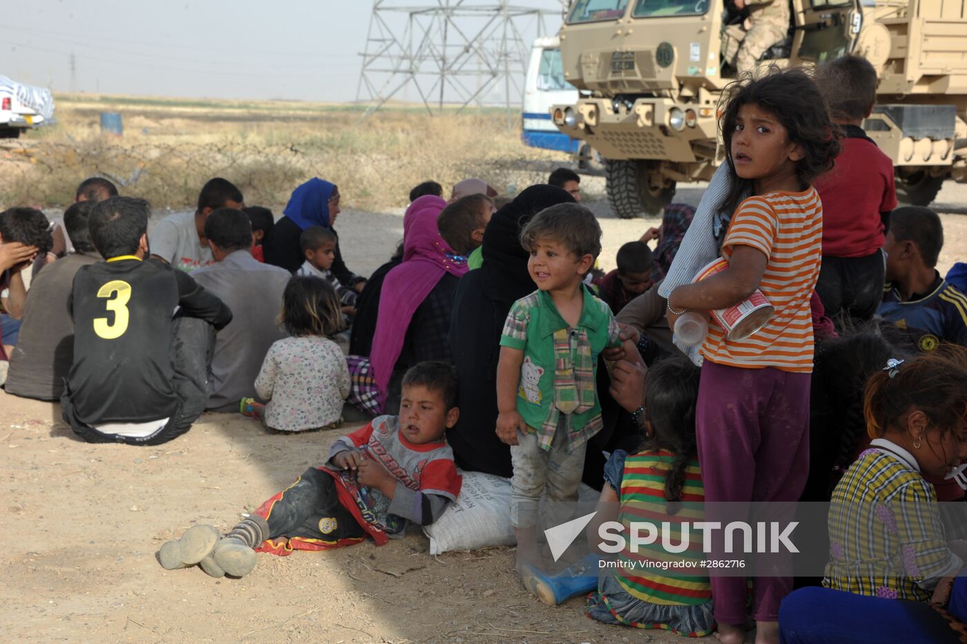 Refugees from ISIL-occupied lands come to Kirkuk in Iraq