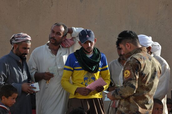 Refugees from ISIS-occupied lands come to Kirkuk in Iraq