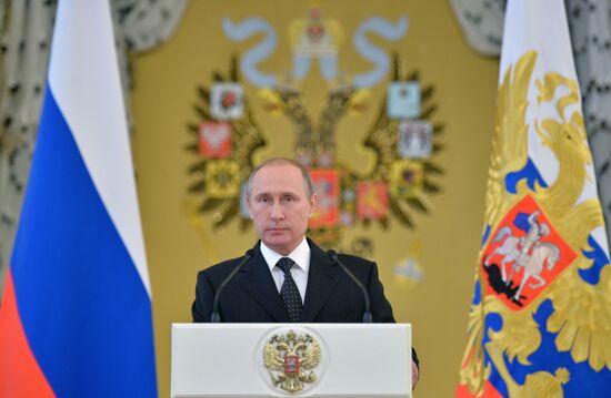 President Vladimir Putin meets with higher military school graduates