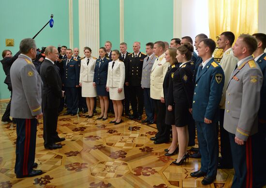 President Vladimir Putin meets with higher military school graduates