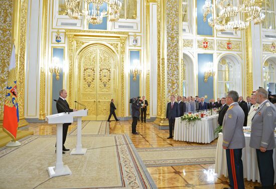 President Vladimir Putin meets with higher military school graduates