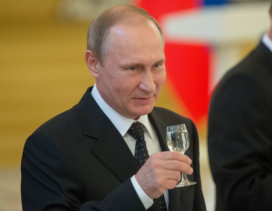 President Vladimir Putin meets with higher military school graduates