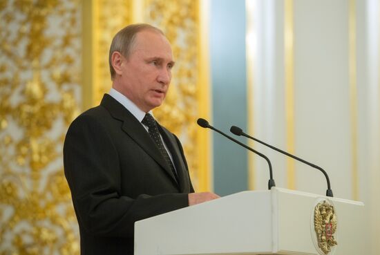 President Vladimir Putin meets with higher military school graduates