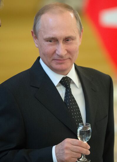 President Vladimir Putin meets with higher military school graduates