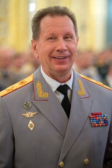 President Vladimir Putin meets with higher military school graduates