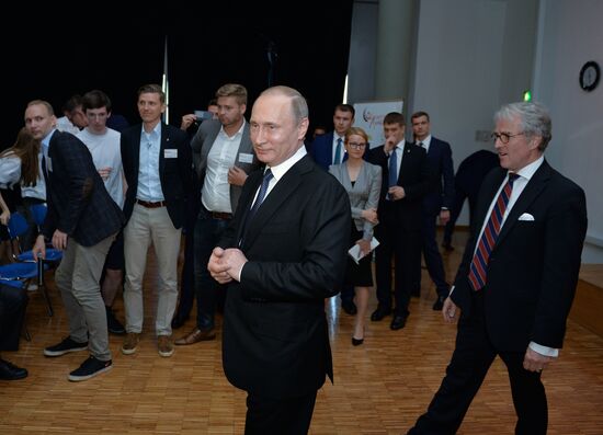 President Vladimir Putin visits German School Moscow at German Embassy in Moscow