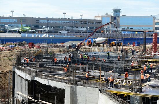 Construction of Domodevo Airport's new terminal