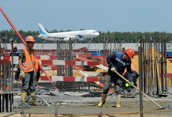 Construction of Domodevo Airport's new terminal