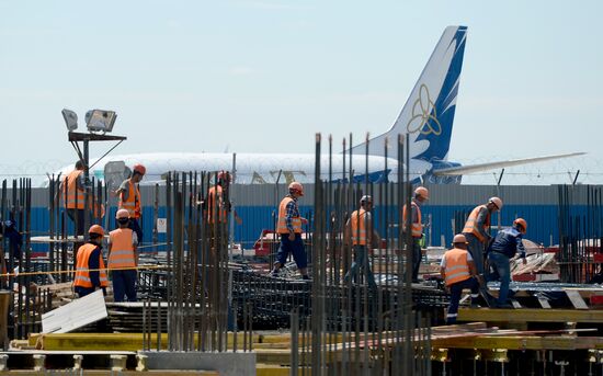 Construction of Domodevo Airport's new terminal
