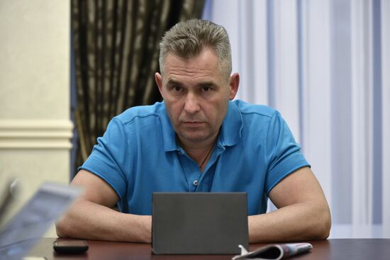 Children's Ombudsman Pavel Astakhov talks with journalists in Simferopol airport