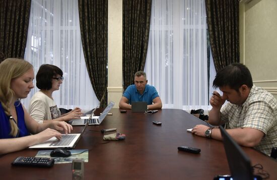 Children's Ombudsman Pavel Astakhov talks with journalists in Simferopol airport