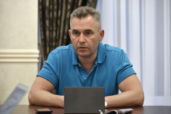 Children's Ombudsman Pavel Astakhov meets with journalists at Simferopol airport