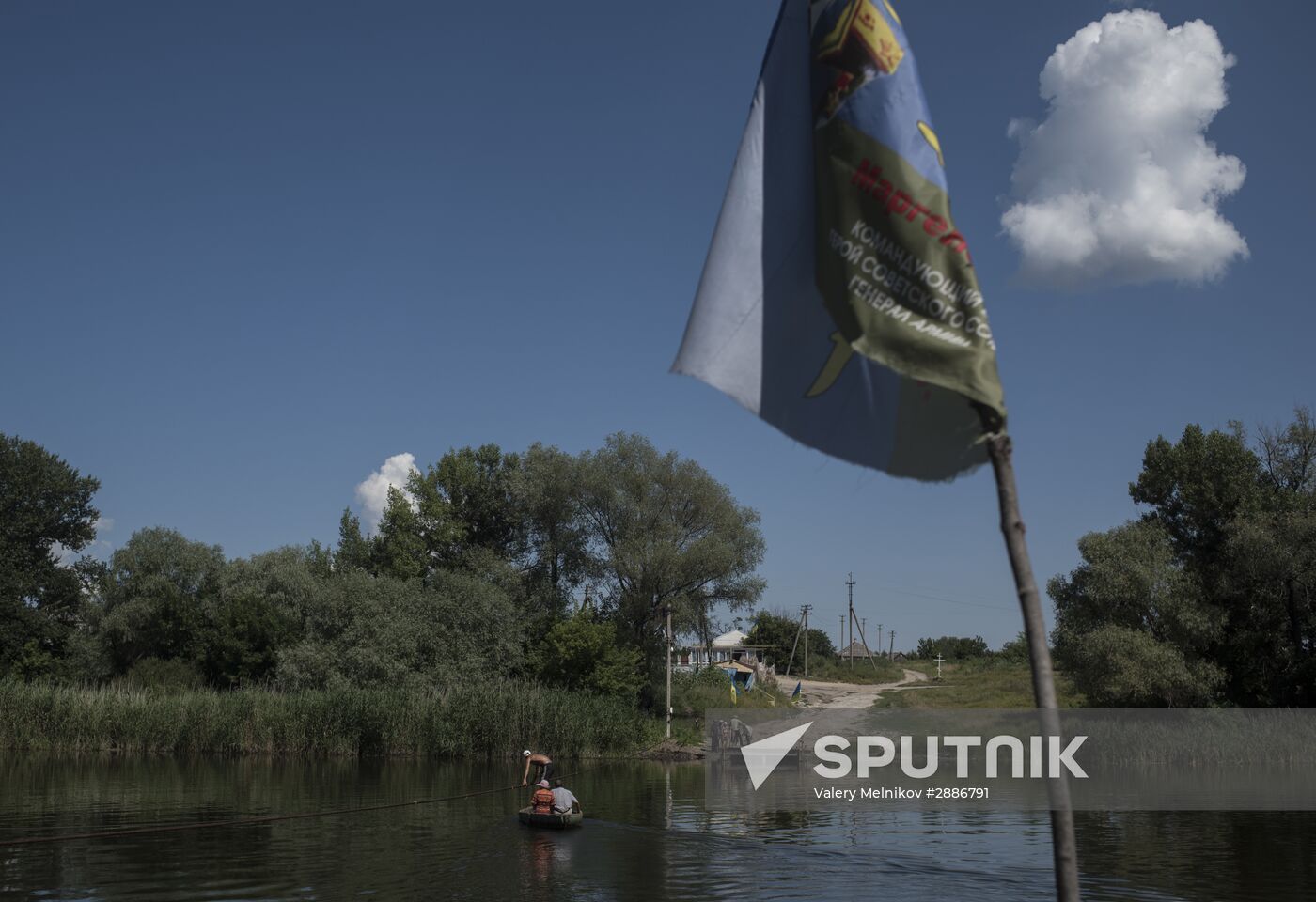 Crossing the Seversky Donets River between the Lugansk People's Republic and Ukraine